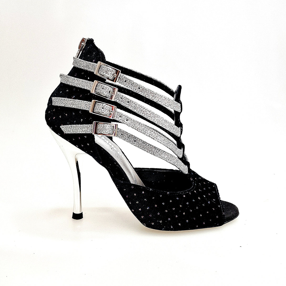 Scarpa da donna Lussuria in velluto nero con punti luce boreali, cinturini glitter argento e tacco a spillo laminato argento.