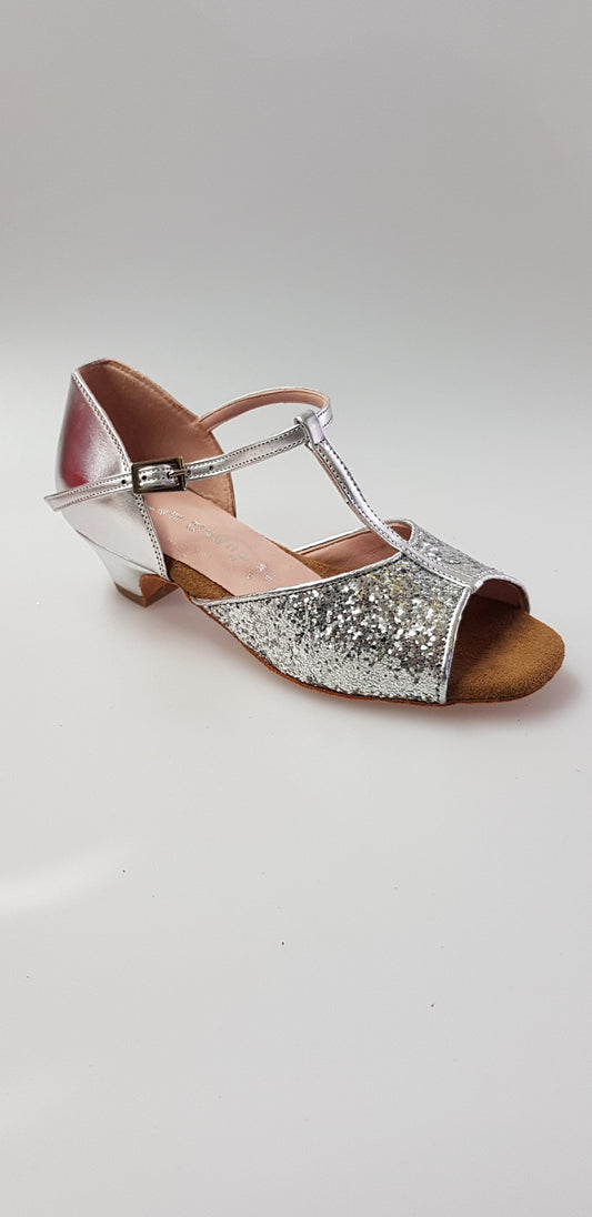 Scarpa da bambina Wishdance Linda in glitter argento con tallone e tacco in pelle argento, design elegante e brillante.