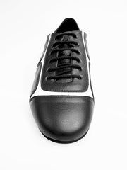 Load image into Gallery viewer, Sneaker Manuel 820 in pelle nera con inserti in vernice bianca, scarpa sportiva con suola bianca e design elegante.