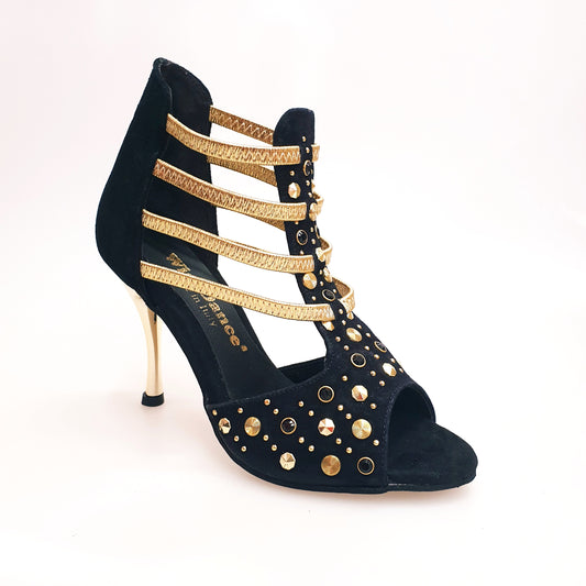 Sandalo donna Swann Elizabeth Pirata in camoscio nero con borchie oro, Swarovski neri, elastici oro e tacco a spillo laminato oro.