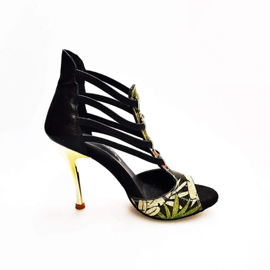 Sandalo donna Lilith Fleur Wish Dance Shop in pelle nera con tomaia oro, elastici neri e tacco slim oro.