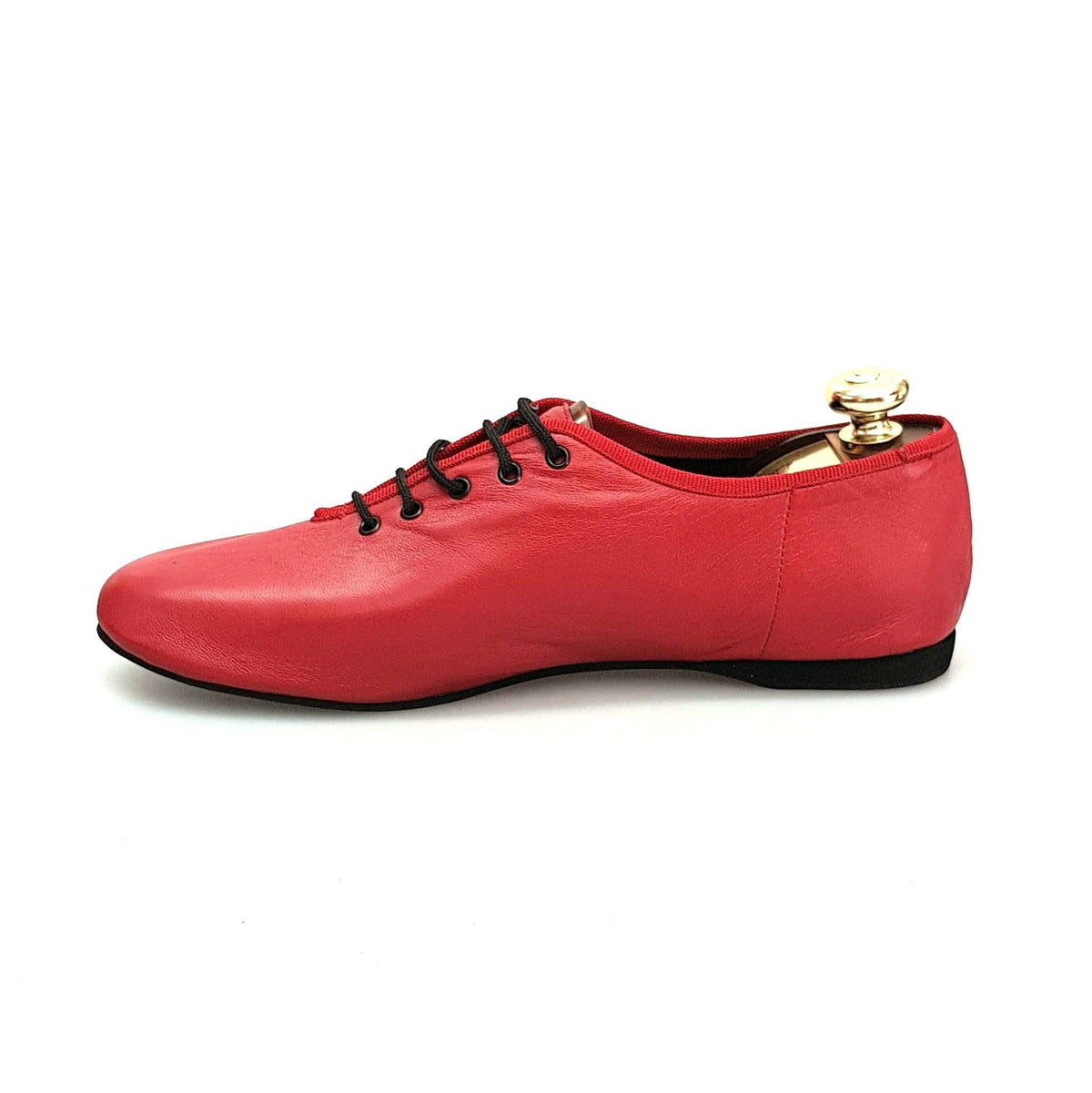 Scarpa Jazz Confort Jazz 04 in pelle rossa di Wish Dance Shop, mostra dettagli della tomaia in pelle rossa e suola.
