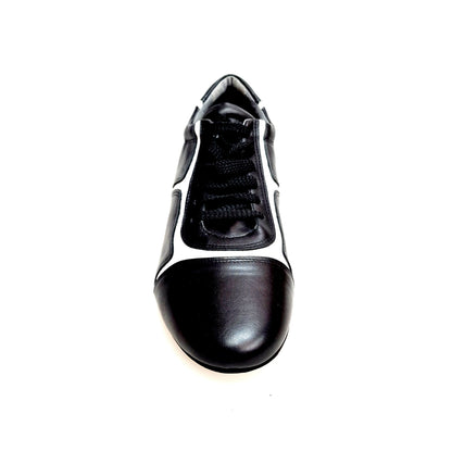 Sneaker Antony 115 da uomo in pelle nera con inserti in vernice bianca, scarpa casual moderna e stilosa.