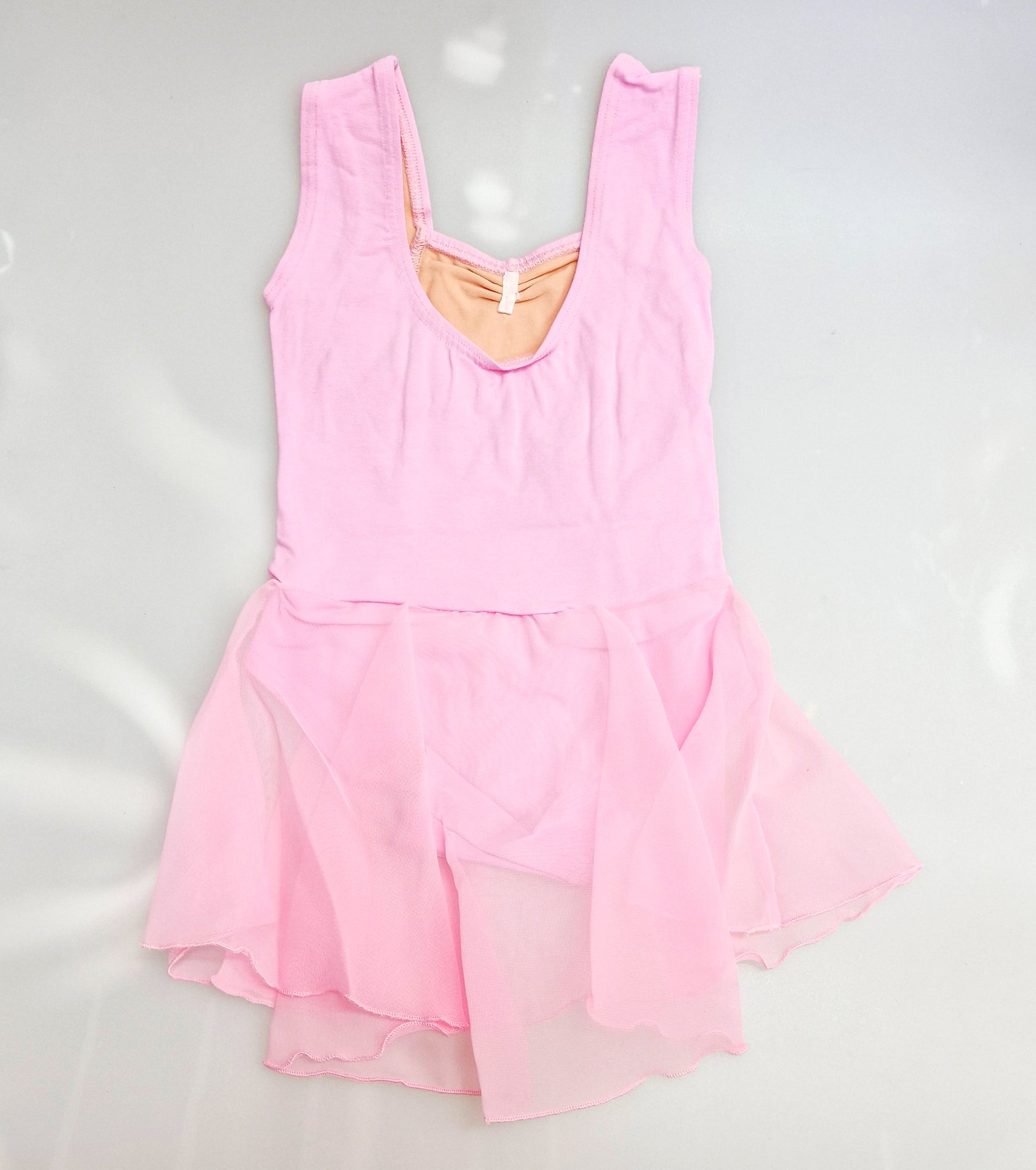 Body danza classica senza maniche per bambina, in cotone elastico con gonna in chiffon, marca Wish Dance Shop.