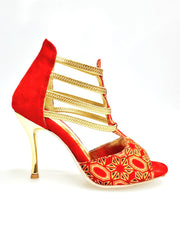 Carica immagine nella Galleria, RED FOX (460PW) - Sandalo da Donna in Camoscio Rosso Elastici Oro con Tessuto Rosso inserti disegnati in Glitter Oro e tacco a spillo laminato Oro
