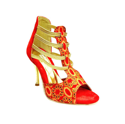 Sandalo donna RED FOX 460PW in camoscio rosso con elastici oro, inserti glitter oro e tacco a spillo laminato oro.