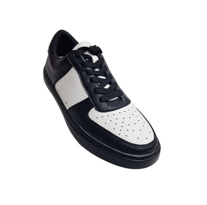 Sneaker ecopelle vegana bianca e nera Wish Dance, suola nera in gomma e resina, dettagli con cerchi bianchi, modello REY.