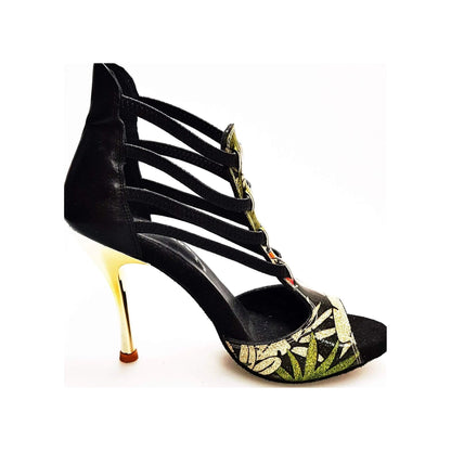 Sandalo donna Lilith Fleur Wish Dance Shop in pelle nera con tomaia oro, elastici neri e tacco slim oro.