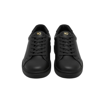 Scarpa sneaker ecopelle nera ATACA Versus Vortex con suola in gomma e resina, dettagli oro e design comodo e leggero.