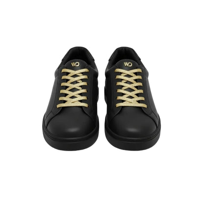 Sneaker Ecopelle totale nera ATACA Versus Vortex con suola in gomma e resina, dettagli oro e design comodo e leggero.