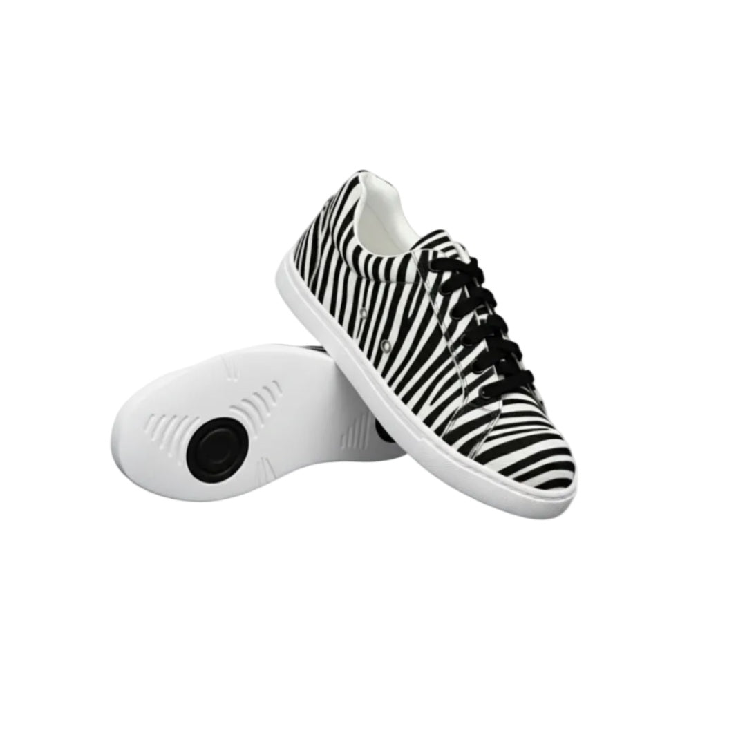 Sneaker ATACA Zebry White Vortex in tessuto zebrato vegano con suola bianca in gomma e resina, dettagli neri pivot, stile confortevole.