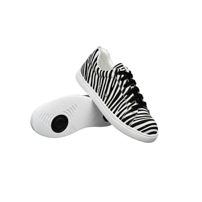 Sneaker ATACA Zebry White Vortex in tessuto zebrato vegano con suola bianca in gomma e resina, dettagli neri pivot, stile confortevole.