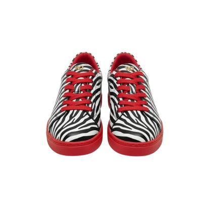 Sneaker Wish Dance Shop ATACA Zebry Red Gold Vortex in tessuto zebrato vegan con suola rossa in gomma e resina, dettagli oro.