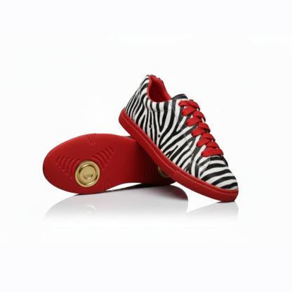 Sneaker Wish Dance Shop ATACA Zebry Red Gold Vortex in tessuto zebrato vegano, con suola rossa in gomma e resina, dettagli oro