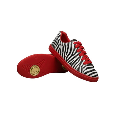 Sneaker Wish Dance Shop ATACA Zebry Red Gold Vortex in tessuto zebrato, suola rossa in gomma e resina, dettagli oro e design vegano.