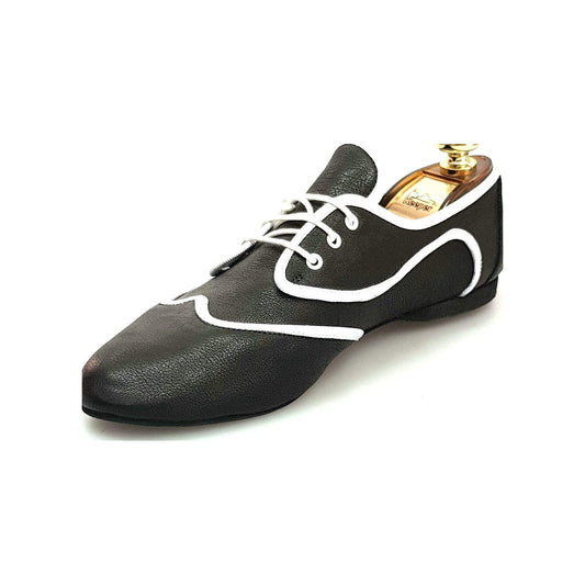 Scarpa jazz Corsaro Jazz 07 in pelle nera con profilo bianco, stile Pachanga, marca Wish Dance Shop.