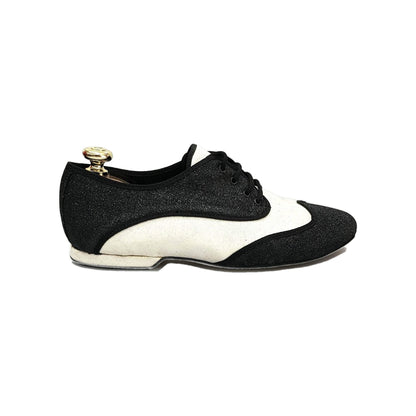 Scarpa jazz Billie Mambo Wish Dance Shop in glitter nero e bianco, con profilo nero, suola e design elegante per ballo.