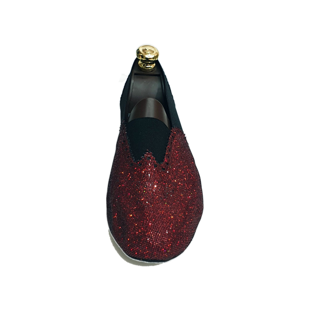Prisma Rosso Elastico Nero Roly 06, prodotto di moda con dettagli colorati e cinturino elastico nero, vista frontale.