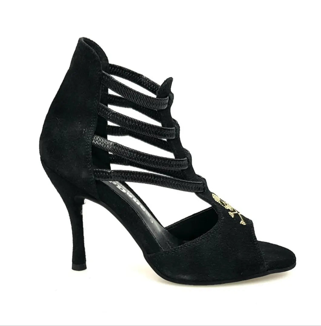 Sandalo da donna Carina Barbossa Pirata Wish Dance Shop in camoscio nero con borchiette oro, teschio e tacco a spillo rivestito.