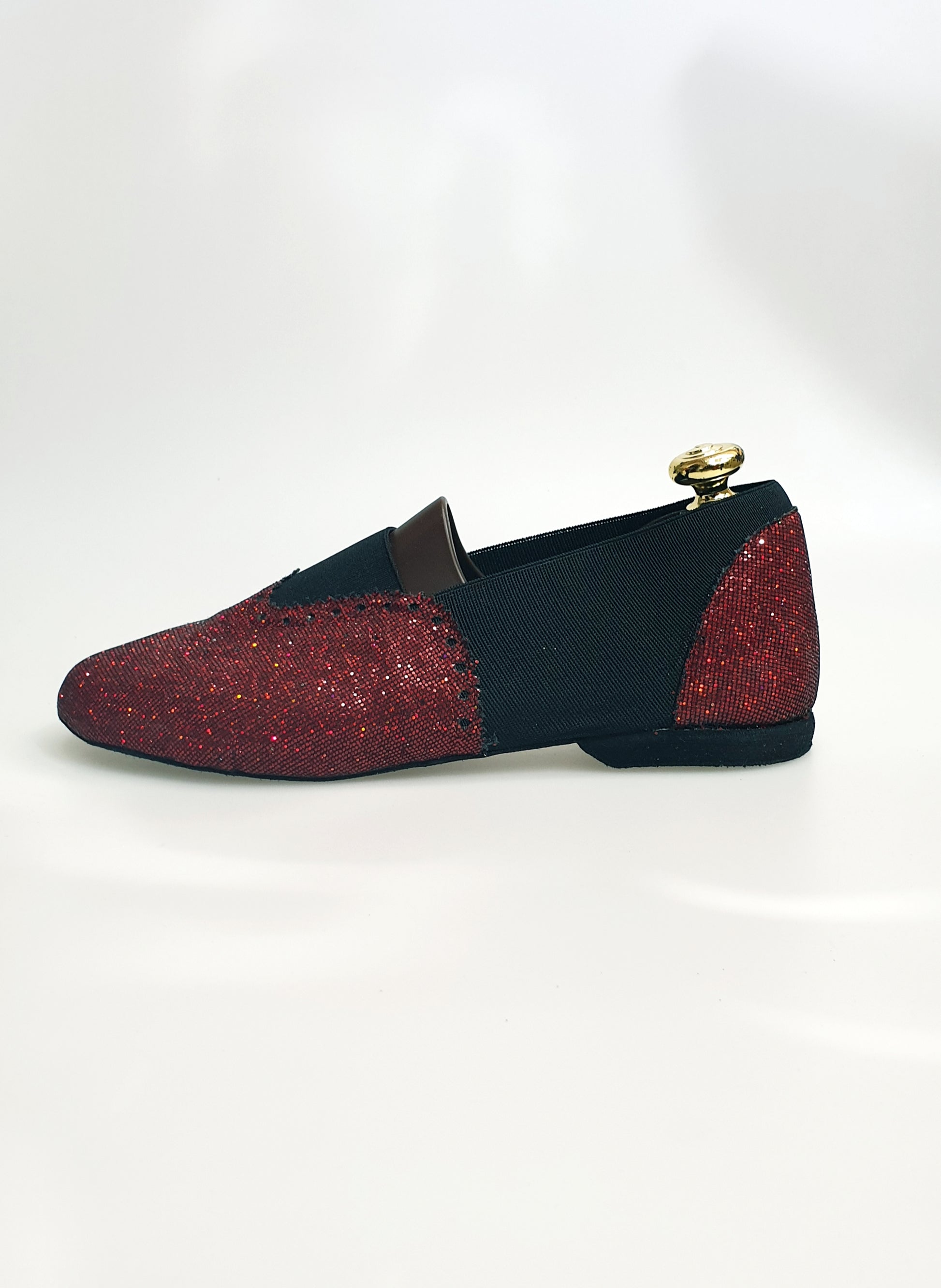 Cavigliera elastica Roly Prisma Rosso con dettagli neri, ideale per attività sportive e fitness.