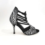 Load image into Gallery viewer, Whole Zebra (460PW) - Woman&#39;s Sandal in Zebra Silk Satin with Black Elastics and stiletto heel covered in zebra silk satin
