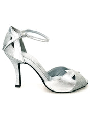 Cargar imagen en la Galería, Scarpa donna Wishdance Ely QA in pelle argento e glitter, cinturino alla caviglia e tacco rocchettino, elegante e brillante.