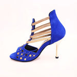 Load image into Gallery viewer, Swann Elizabeth Pirata (460PW) - Sandalo da Donna in Camoscio Blu Royal con Borchie Oro e Swarovski Neri Incastonati elastici Oro tacco a spillo laminato oro
