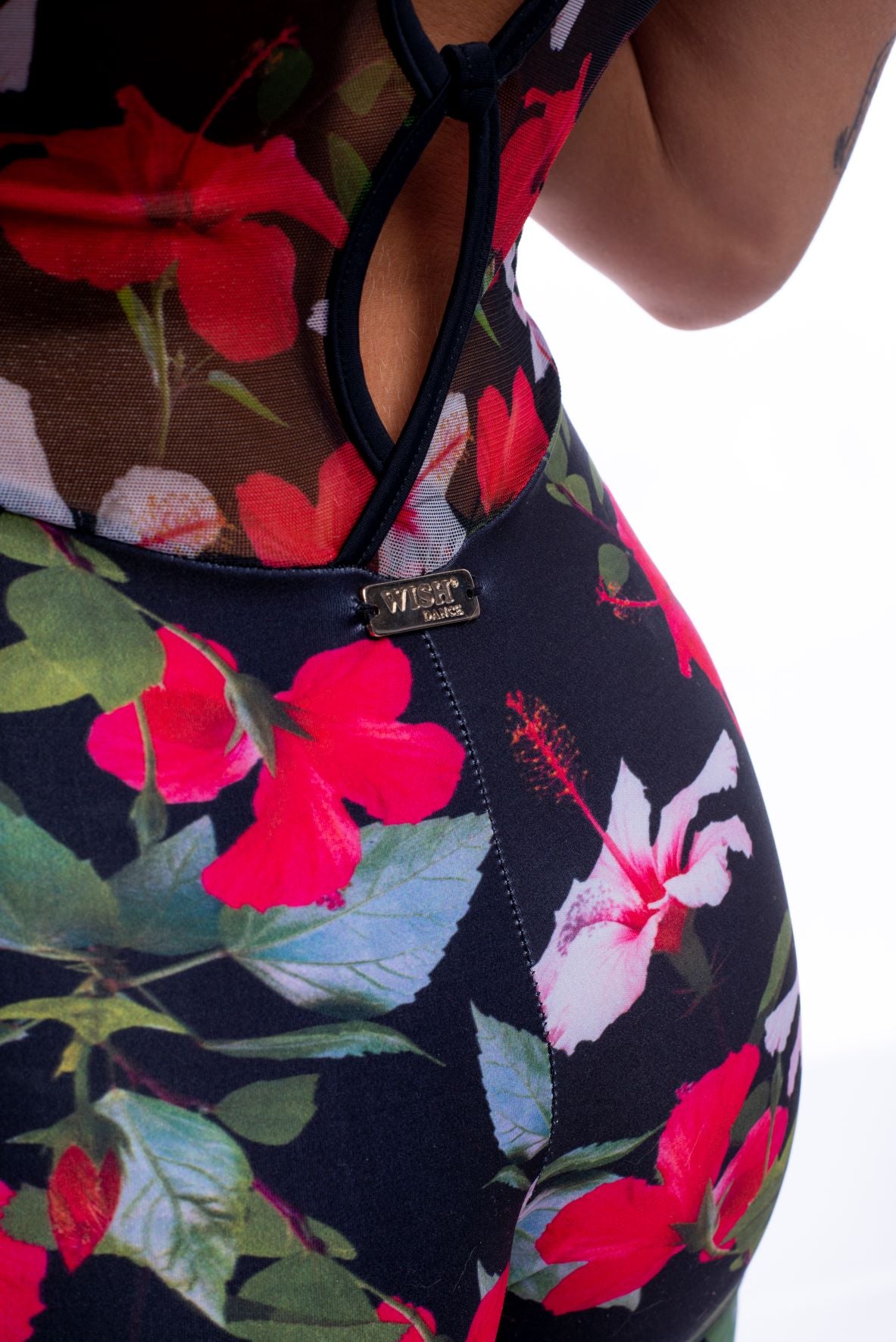 Giacca jumpsuit in microfibra traspirante e modellante con disegno floreale colorato e retina laserata, Wish Dance Shop.