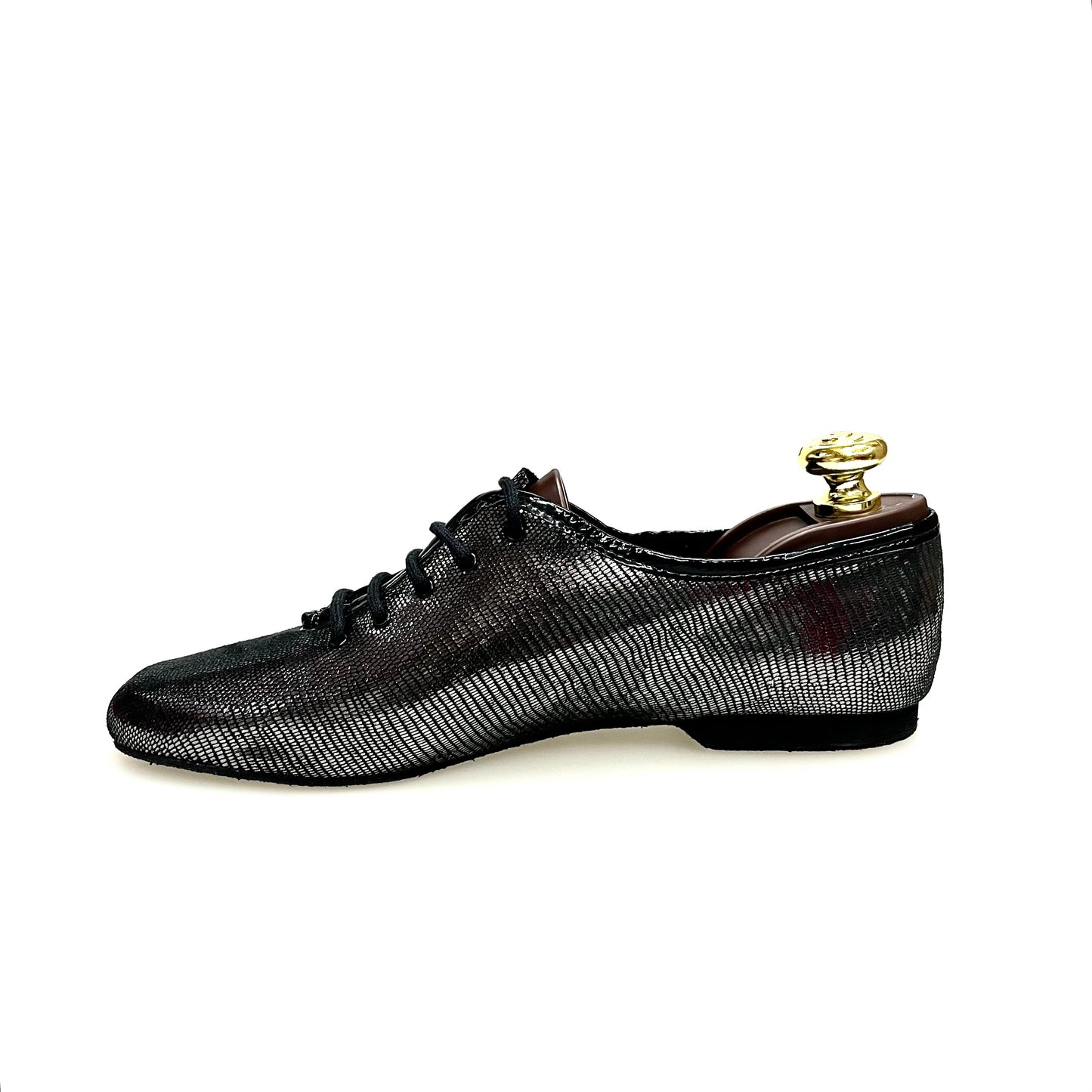 Scarpa da allenamento Jazz 03 in pelle stampata lucertola con dettagli in canna di fucile, stile sportivo e moderno.