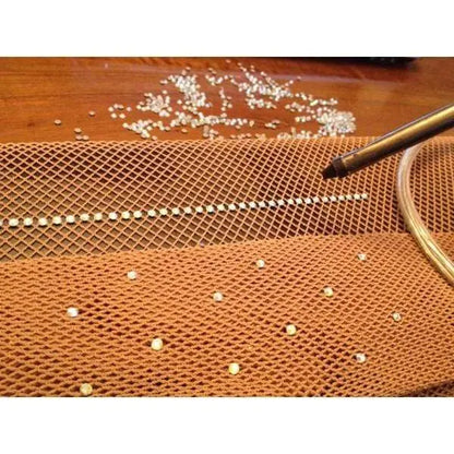 Collant professionali in rete Swarovski con cristalli, dettagli modellanti e attacco occhiello, design elegante e raffinato.