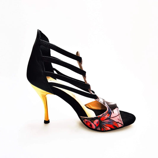 Sandalo da donna Lilith Fleur Wish Dance Shop in pelle nera con tomaia fucsia, elastici neri e tacco slim oro.