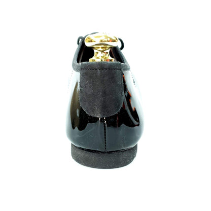 Scarpa Jazz Confort Jazz 04 in vernice nera, modello di Wish Dance Shop, con suola liscia e design elegante.