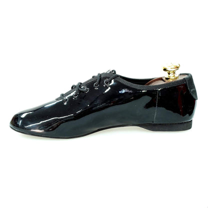 Scarpa Jazz Confort Jazz 04 in vernice nera, con suola antiscivolo e design elegante, ideale per danza e performance.