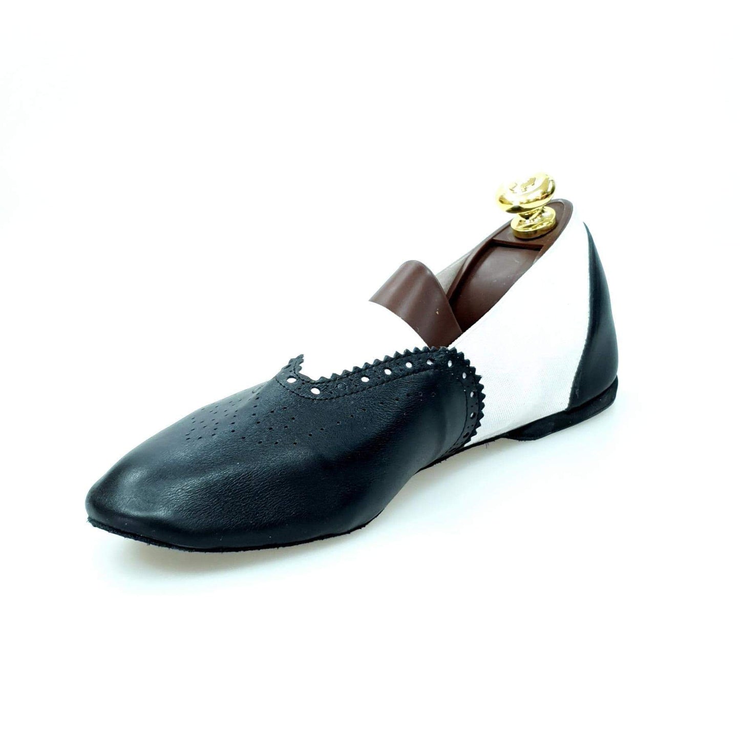 Scarpa jazz Roly Jazz 06 in pelle nera con elastico bianco, suola bufalo e tomaia flessibile per comfort.