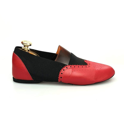 Scarpa Roly Jazz 06 in pelle rossa con elastico nero, suola bufalo, design confortevole e flessibile per danza.