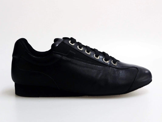 Scarpa sneaker 113H in pelle nera Horus, stile sportivo e moderno, con dettagli in tessuto e suola in gomma.