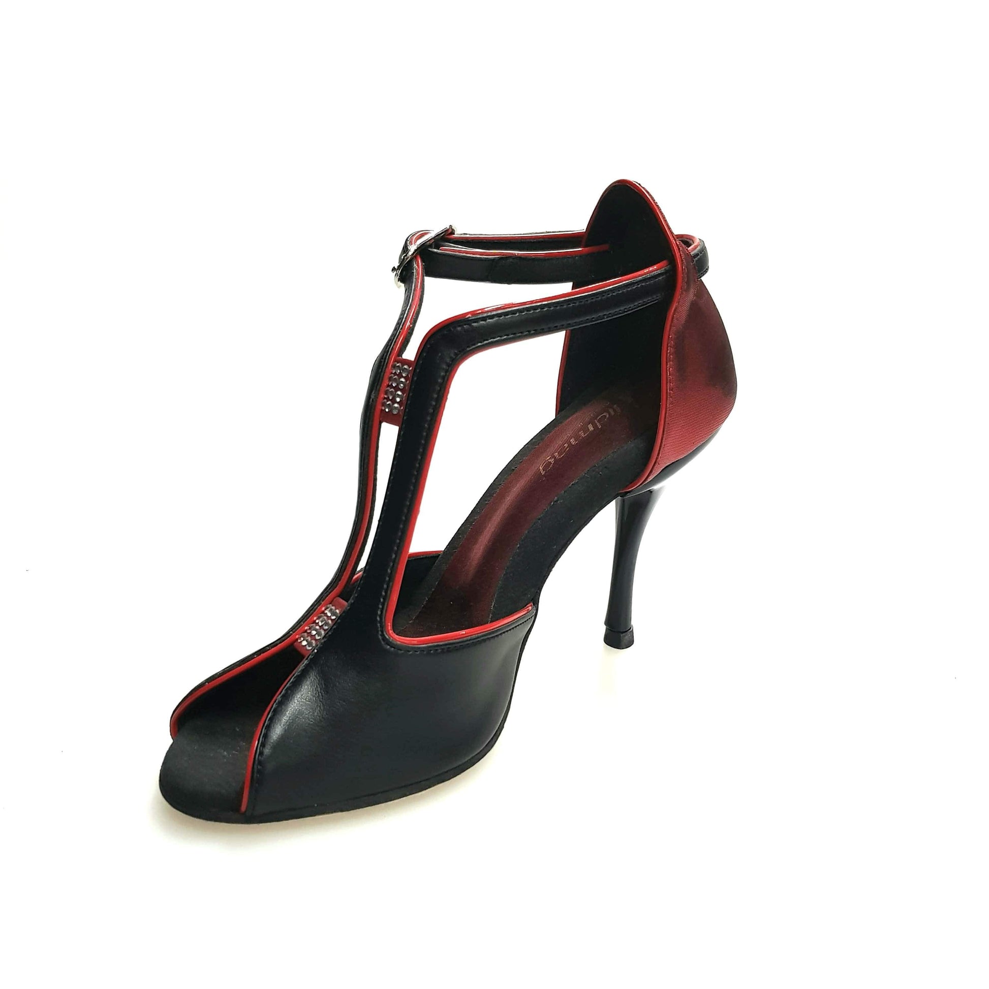 Scarpa da donna Wishdance in pelle nera con tallone in lurex rosso e dettagli eleganti, ideale per look sofisticati.