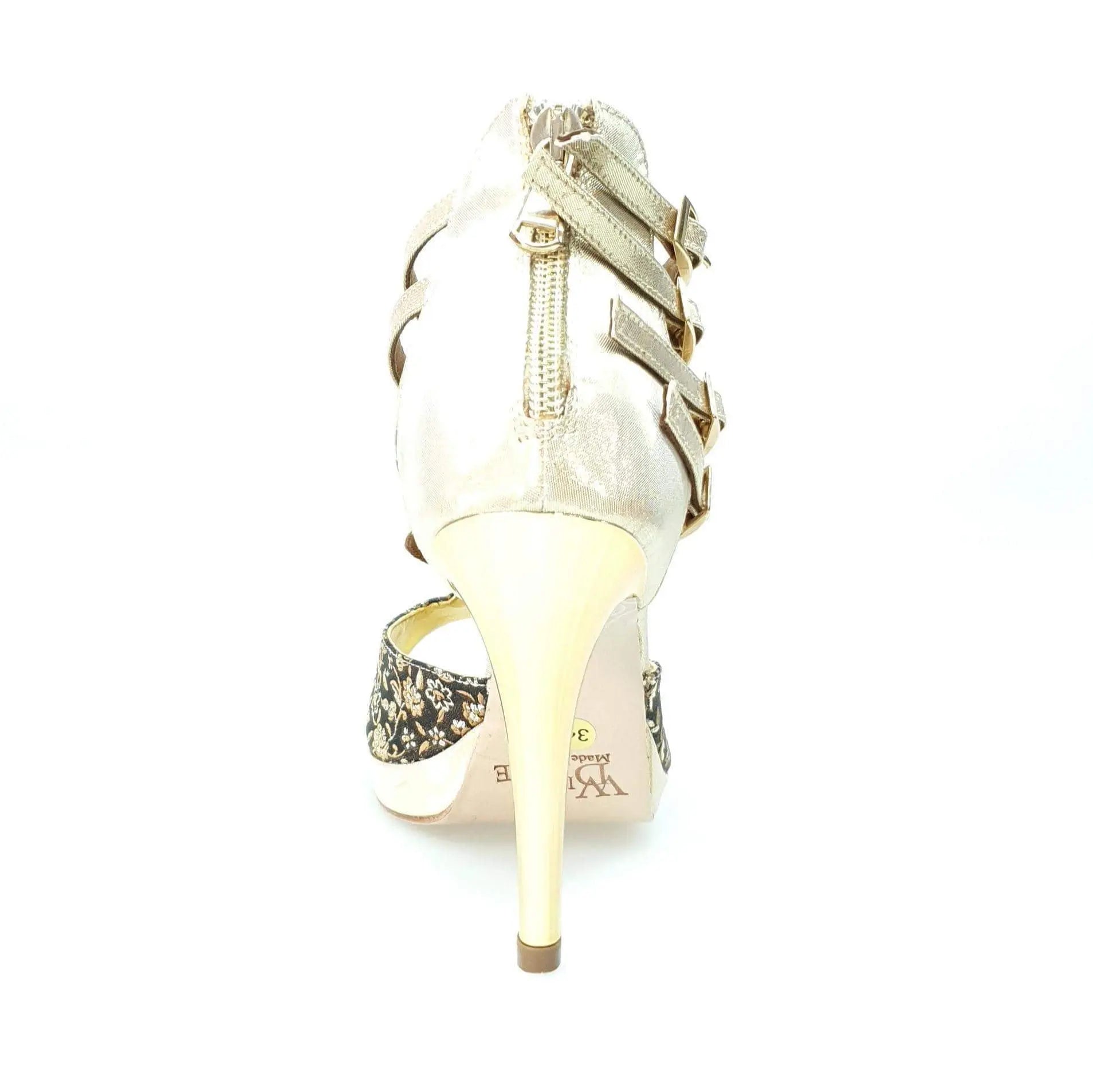 Scarpa da donna Wishdance Lussuria in ricamo veneziano fiorato oro, tacco a spillo e plateau, elegante e raffinata.