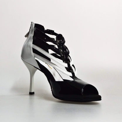 Scarpa da donna Wishdance Malon (779) in vernice nera e bianca con tacco a stiletto e dettagli rocchettino.