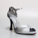Cargar imagen en la Galería, Scarpa da donna Wishdance Ely QA in pelle argento e glitter, cinturino alla caviglia e tacco rocchettino.
